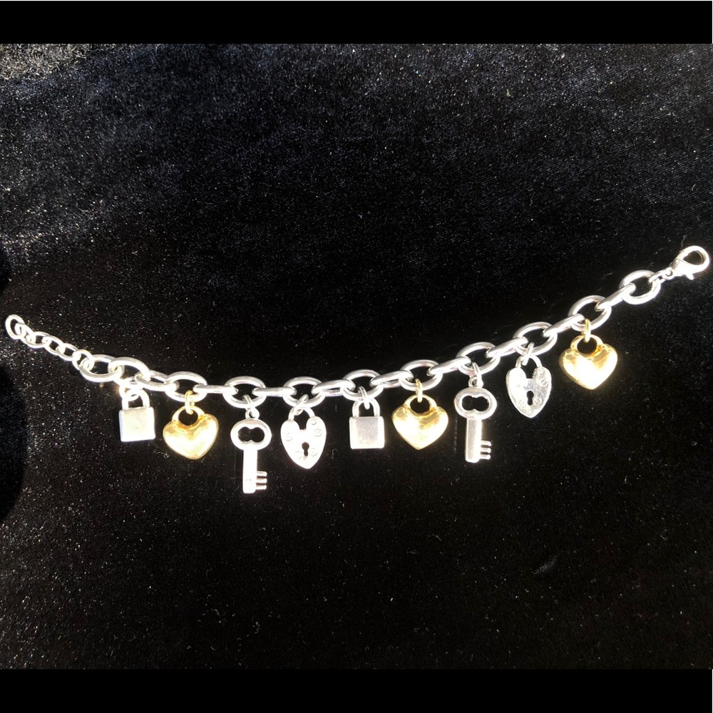 Adorable gold and silver charm bracelet